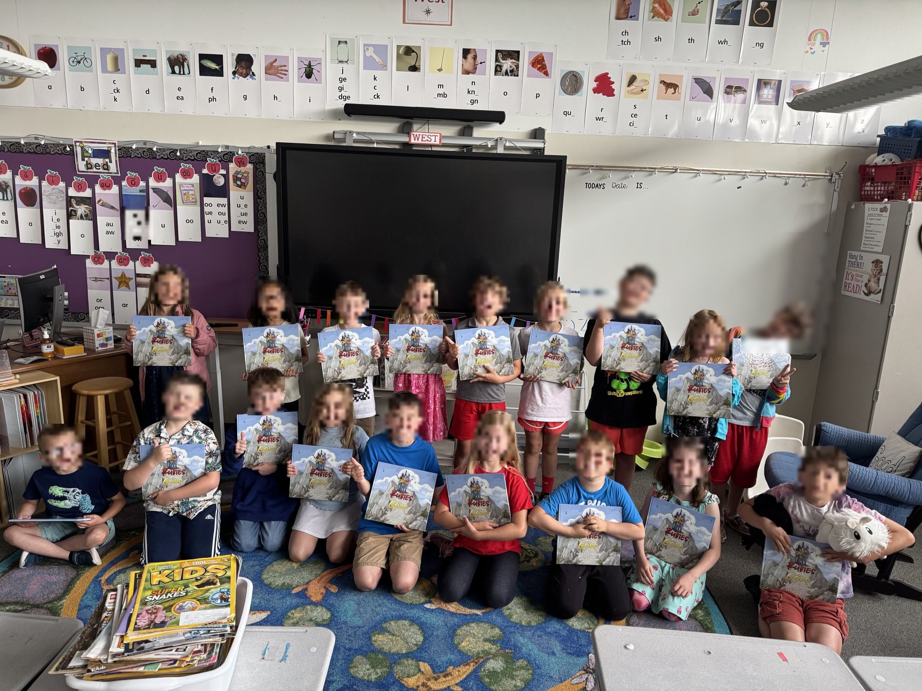 A classroom of children holding their own copies of Rubies and Gold.